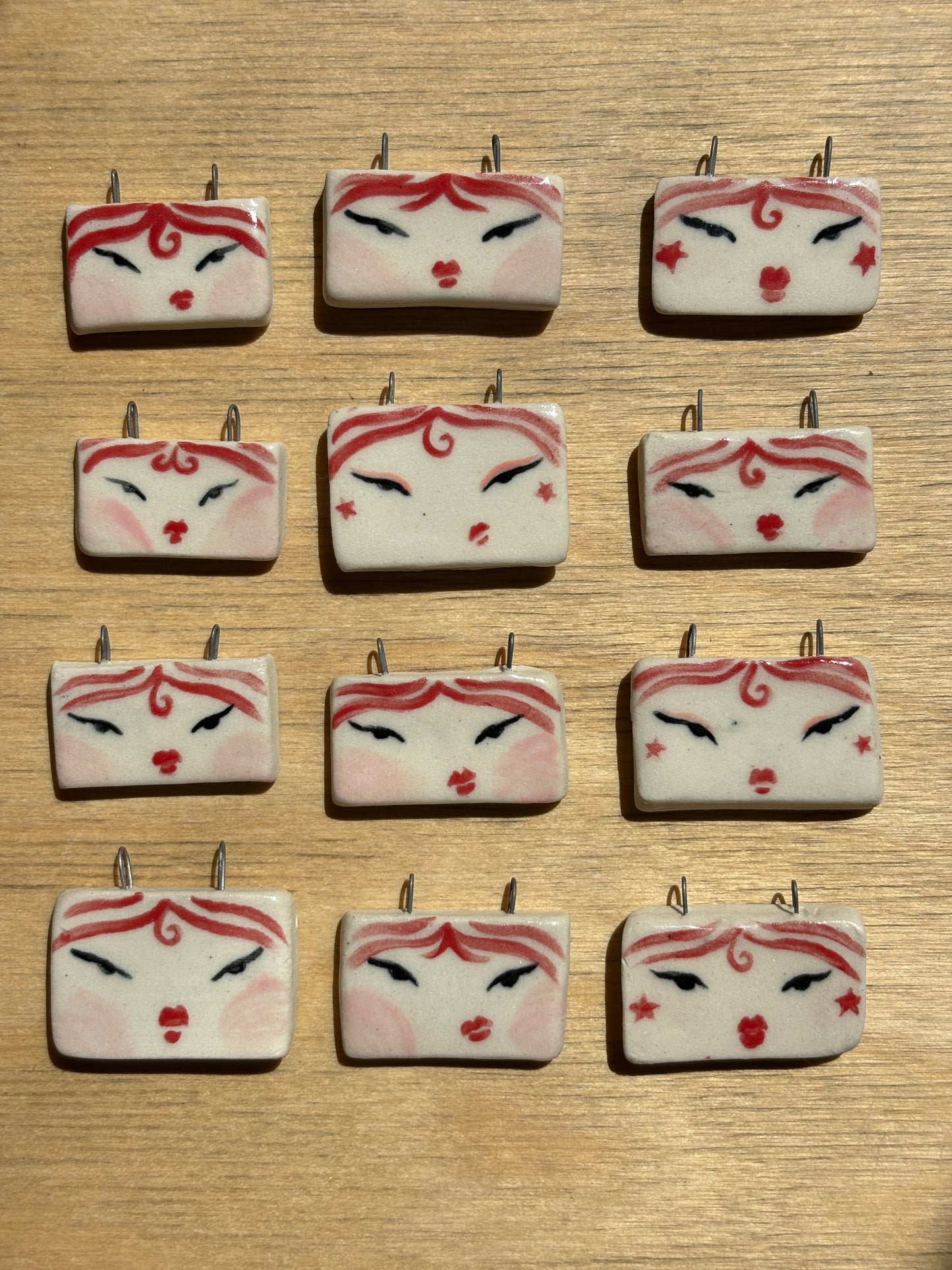 Red Face Charms
