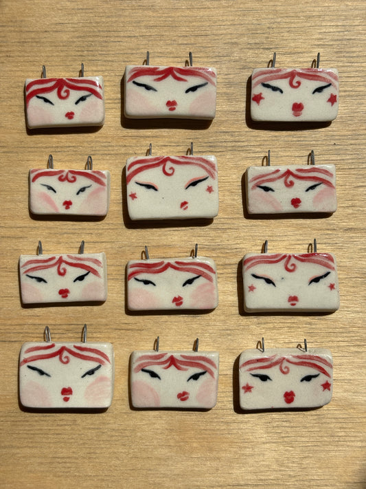 Red Face Charms